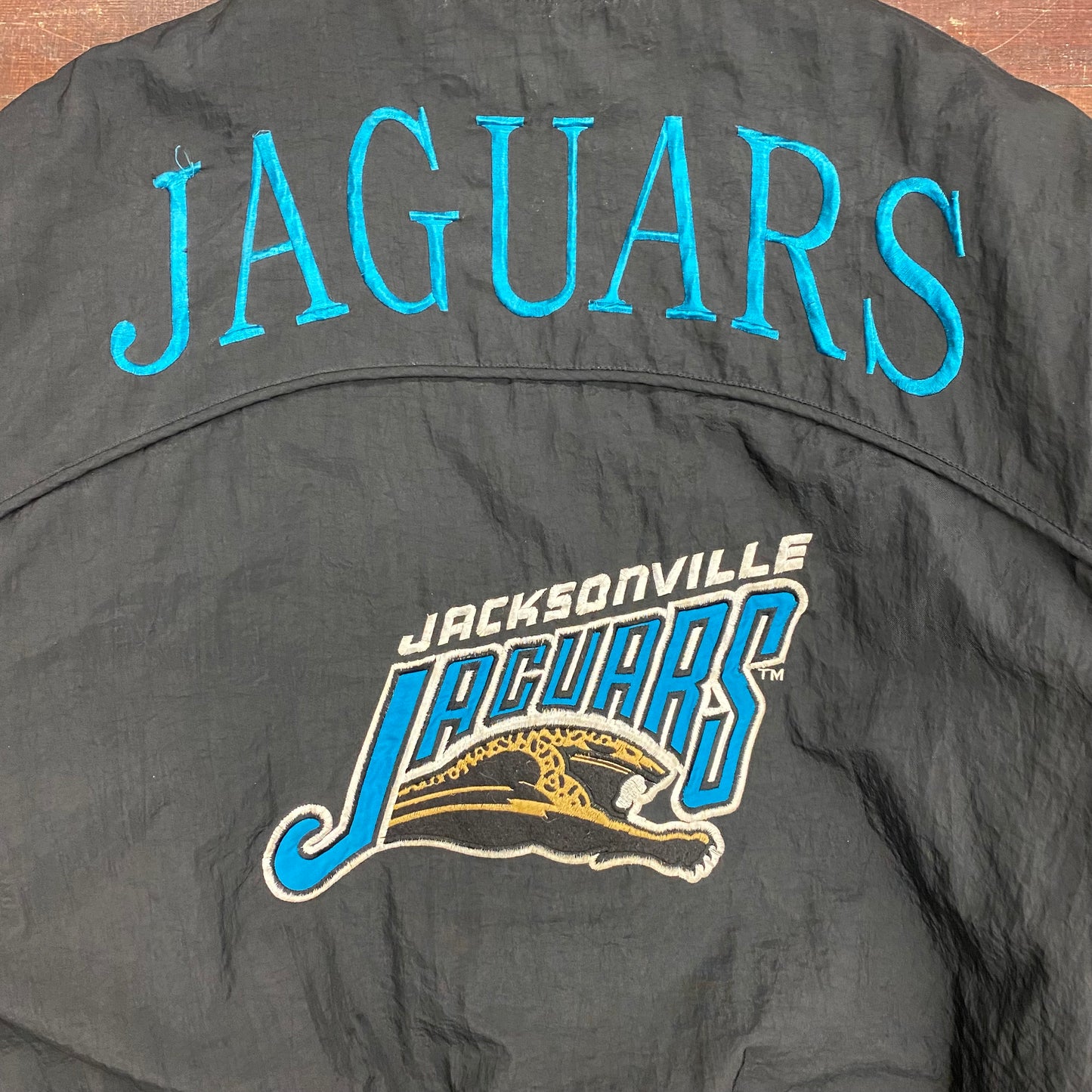 1990s Jacksonville Jaguars Football Banned Logo Puffer Jacket by Nutmeg Mills - Size Large